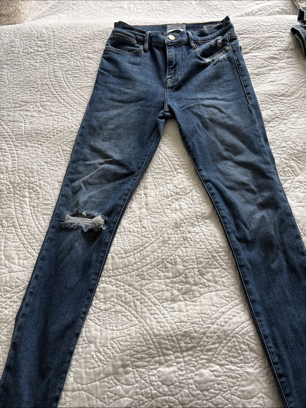 Frame Denim Skinny Jeans in Dark Blue with Distressed Knee